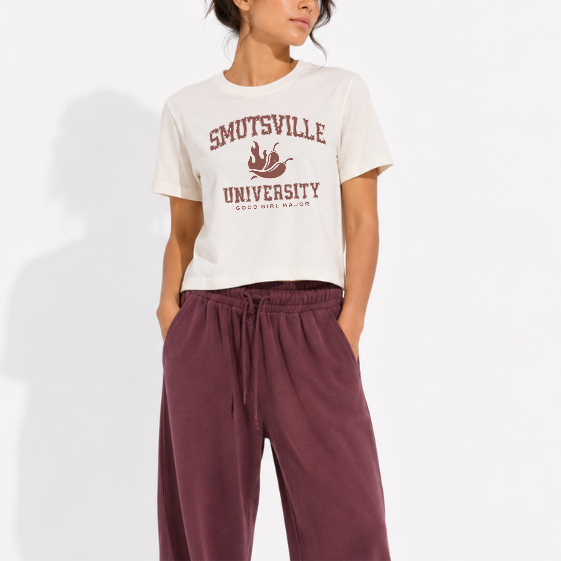 Vintage-inspired Smutsville University Good Girl Major women's garment-dyed t-shirt for romance readers, book lovers, bibliophiles, and spicy book fans.