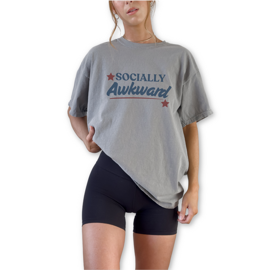 Socially Awkward retro unisex t-shirt featuring vintage-inspired graphic design. Vintage style Socially Awkward graphic tee with bold introvert humor.  Retro unisex t-shirt with Socially Awkward statement design for introverts.