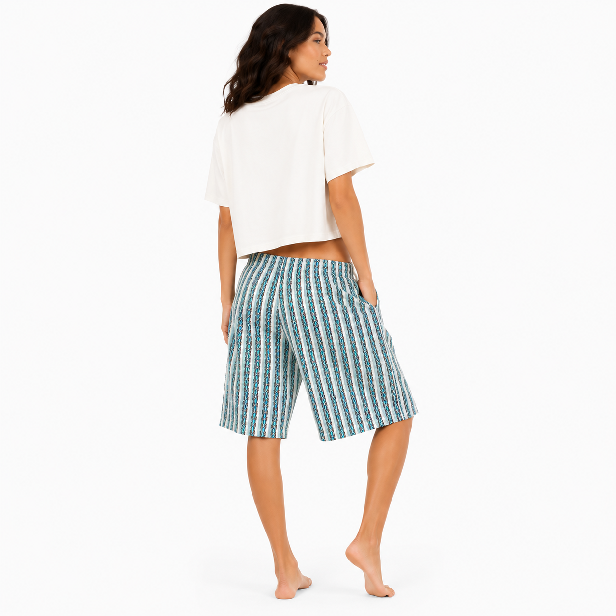 Back view of a women's heavyweight boxy crop tee showing the relaxed cropped fit and clean back while wearing the Summer Daze graphic shirt.