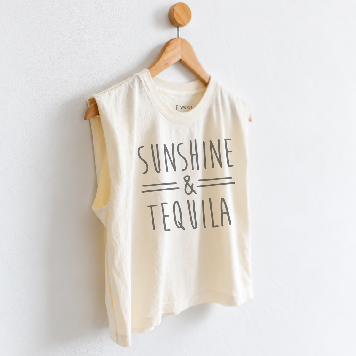 Women’s Sunshine & Tequila muscle tank featuring a fun tequila lover graphic, perfect for beach vacations, margarita nights, girls trips, happy hour, and sunny days. Fineish