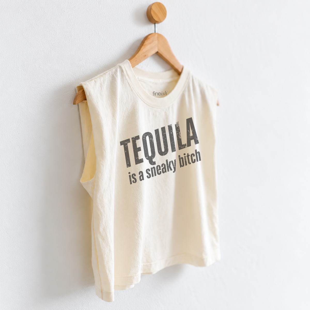 Women’s Tequila Is a Sneaky B*tch muscle tank featuring a funny tequila saying, perfect for margarita nights, girls trips, happy hour, and girls night.