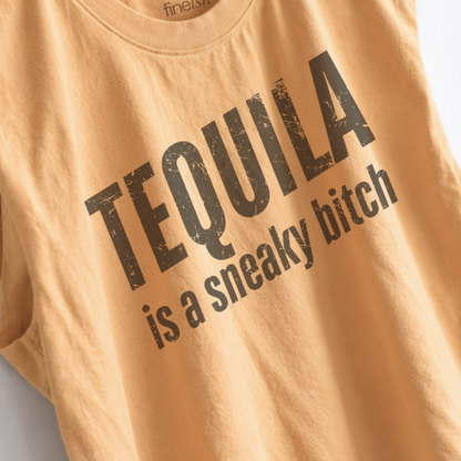 Women’s Tequila Is a Sneaky B*tch muscle tank featuring a funny tequila saying, perfect for margarita nights, girls trips, happy hour, and girls night. up close of eco friendly ink garment print
