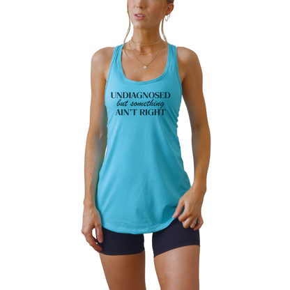 Women’s racerback tank with Undiagnosed but Something Ain’t Right quote. Lightweight fitted graphic tank for summer and workouts.