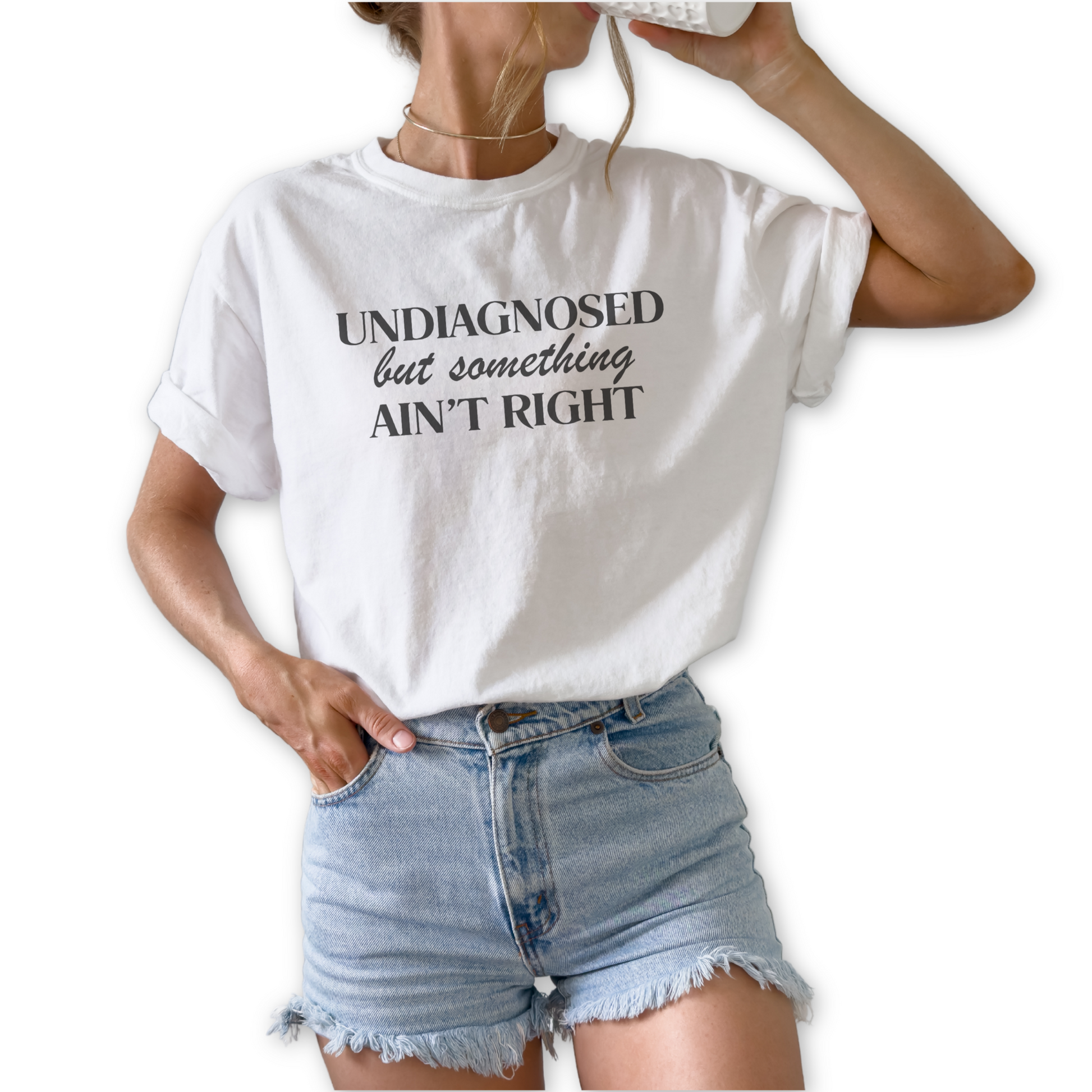 Undiagnosed but Something Ain’t Right unisex graphic t-shirt featuring sarcastic humor statement design.