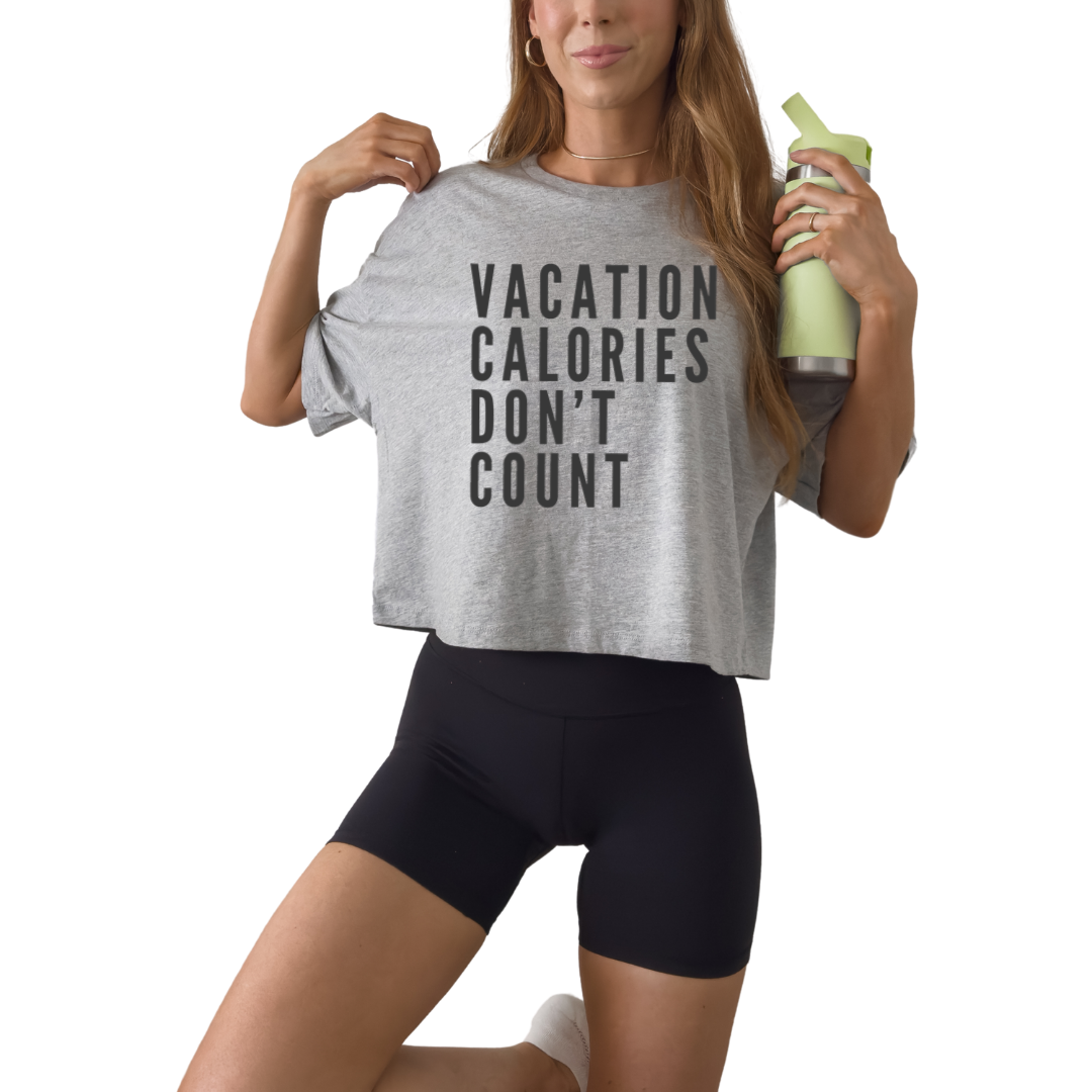 Vacation Calories Don’t Count women’s crop tee designed for girls trips and beach vacations.