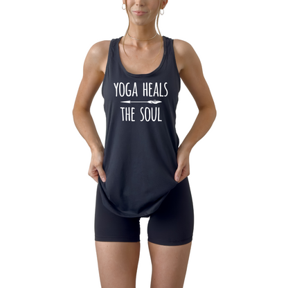 Women’s racerback tank top featuring “Yoga Heals the Soul” design, lightweight and breathable yoga shirt ideal for workouts, meditation, pilates, and daily fitness, soft activewear promoting mindfulness, balance, and wellness, flattering athletic fit perfect for studio or casual wear black tank top